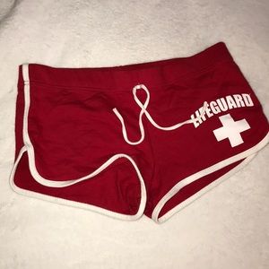 red lifeguard shorts